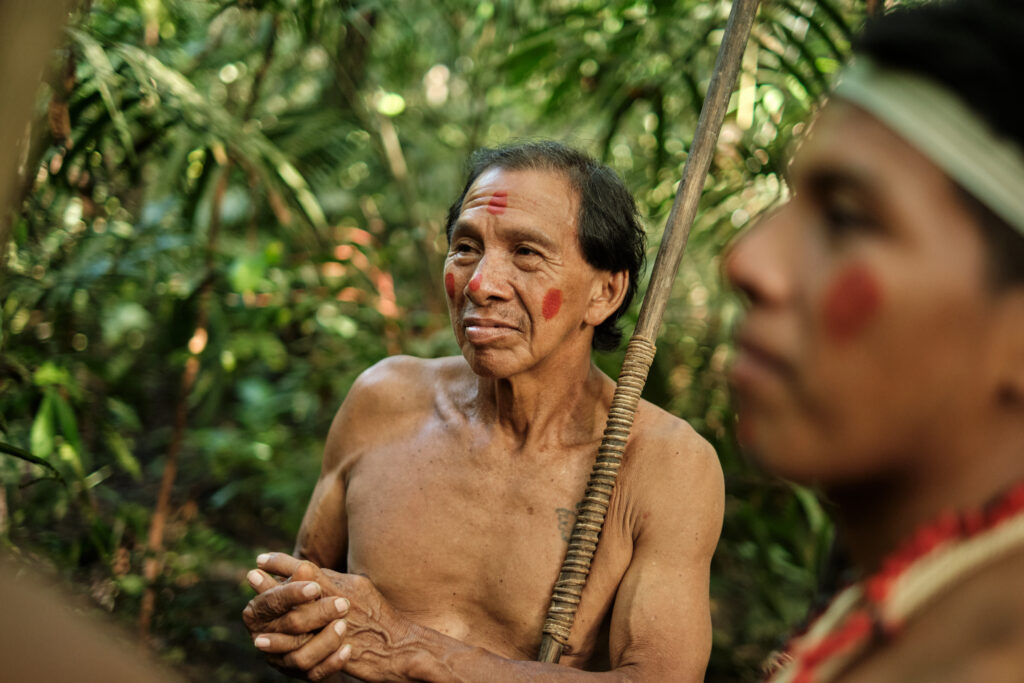Tiri, Nemonte’s father during a walk in the forest, Ecuadorian Amazon. Photo Christopher Fragapane / Amazon Frontlines 