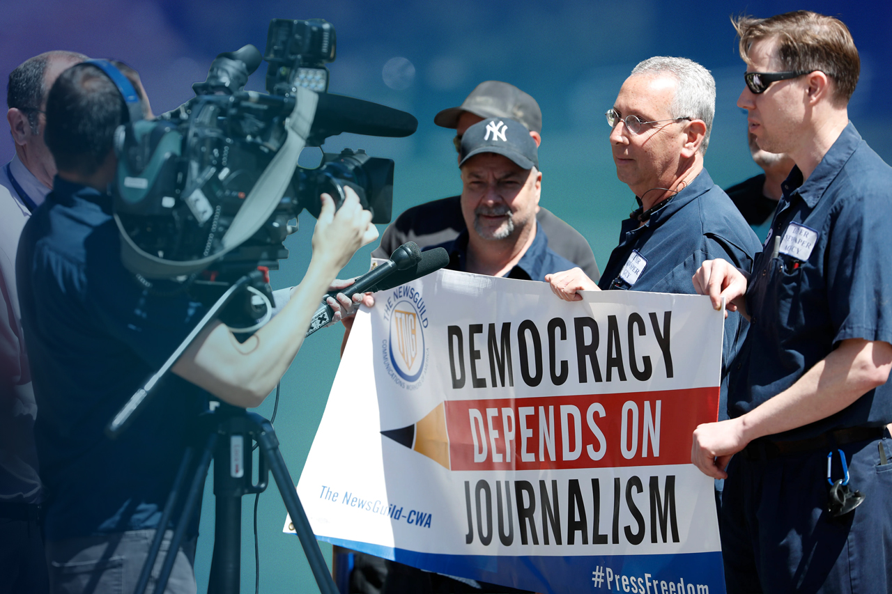 Frank Donato, center right, joins fellow pressmen at The Denver Newspaper Agency, is speaking to reporters during a rally against ownership group, Alden Global Capital outside The Denver Post's office and printing plant in north Denver. Credit: David Zalubowski, The Associated Press