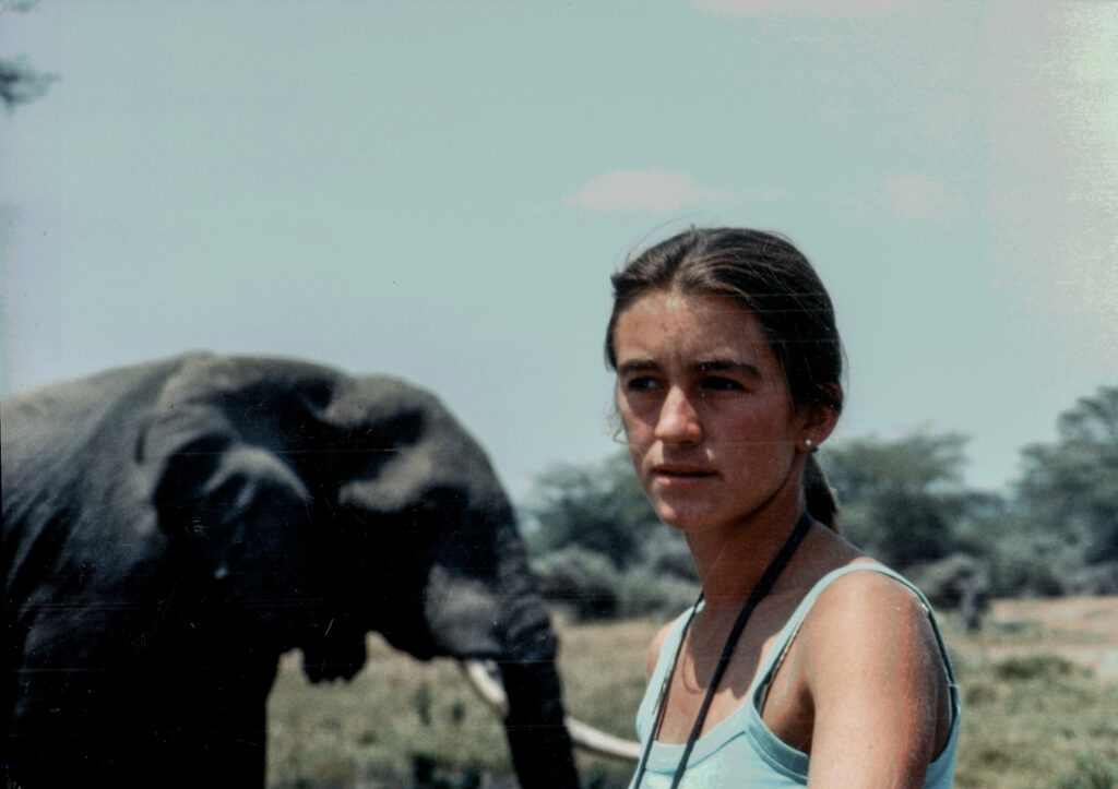 Joyce photographed in Amboseli, Kenya, in 1978 with elephant Patrick. Credit: ElephantVoices