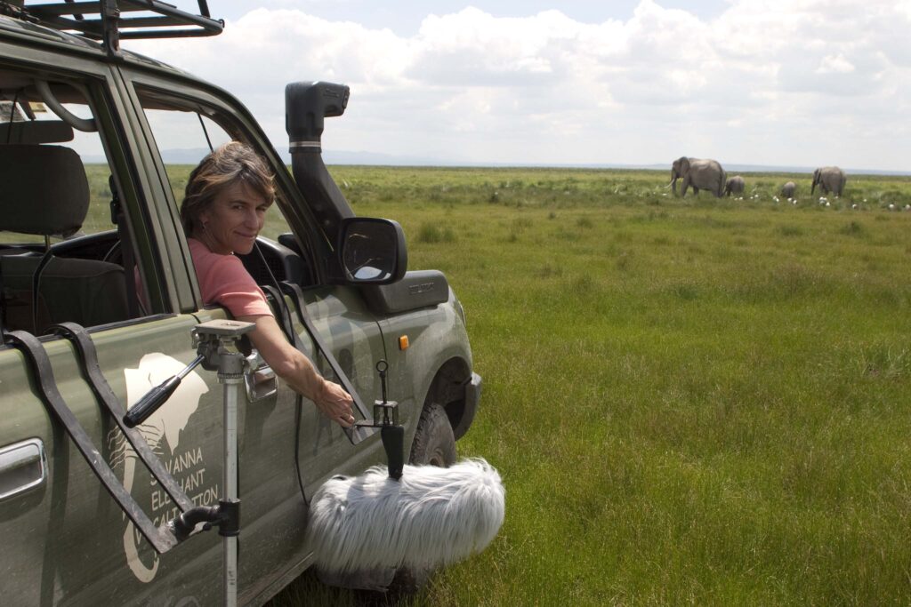 Joyce recording elephants in Amboseli, Kenya, circa 2000. Credit: ElephantVoices