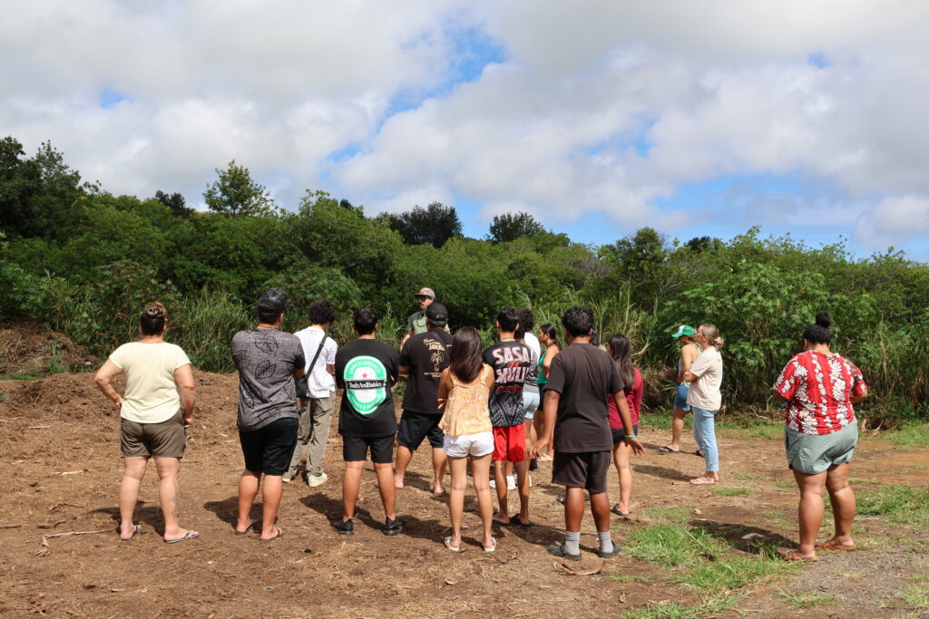Youth gathered at the Wai'ohinu transfer station with Alex White, Hawaii County's recycling specialist. Credit: Jennifer Makuakane