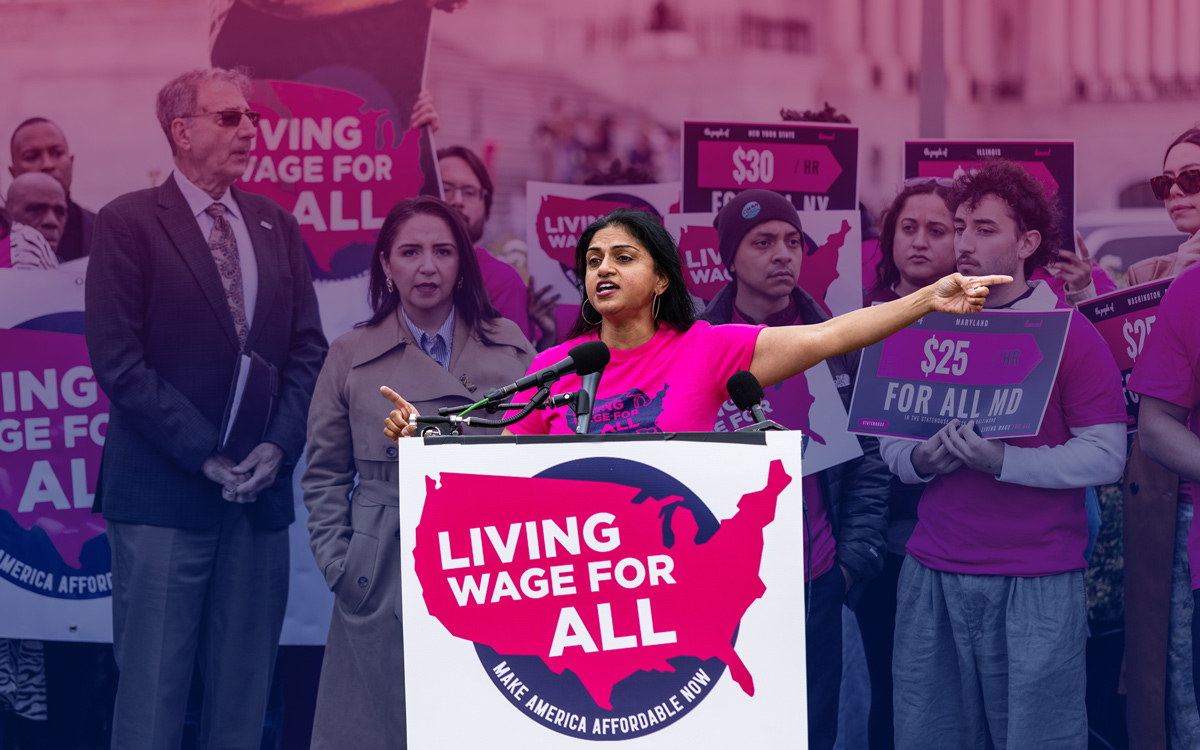 Saru Jayaraman speaking at the federal Living Wage For All Act introduction. Photo by D. Freeman.